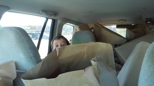 Kaden with bags in car 1