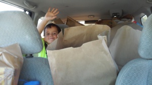 Kaden with bags in car 2